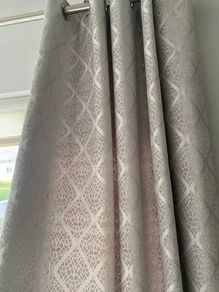 Grey patterned eyelet curtains