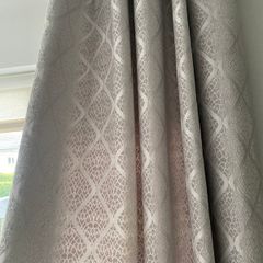 Grey patterned eyelet curtains