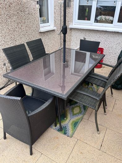 garden furniture table and chairs, parasol and parasol weight