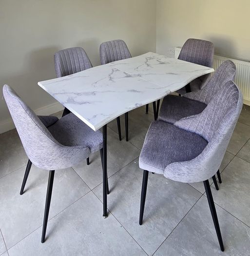 Extendable dining table with chairs on sale