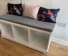 Padded hallway bench with underseat shoe storage