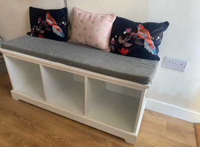Padded hallway bench with underseat shoe storage