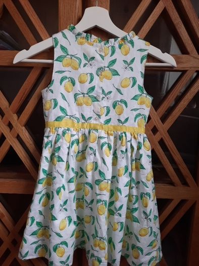 Girls lemon dress size 6-7 years