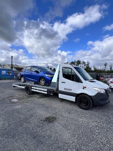 Recovery towing service