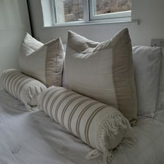 Cream striped cushions