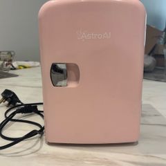 Pink mini fridge