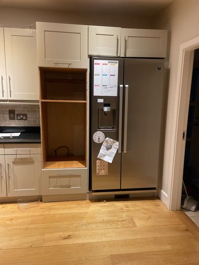 Entire kitchen Quartz work top solid wooden shaker style doors