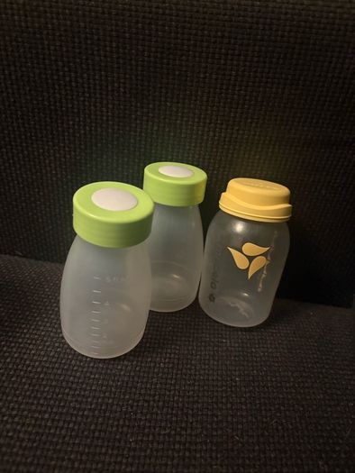 Breast pump, glass bottles and milk containers