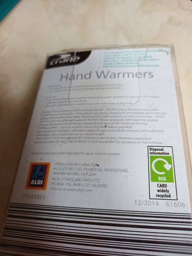 Hand Warmer - Reusable With Knitted Cover.  In Original  Packaging.
