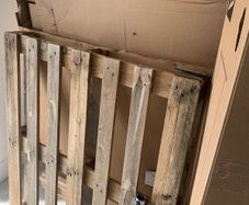 Wooden pallets and cardboard boxes
