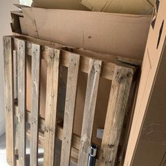 Wooden pallets and cardboard boxes