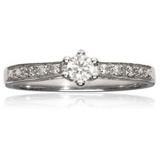 9k gold Diamond ring with diamond sholders