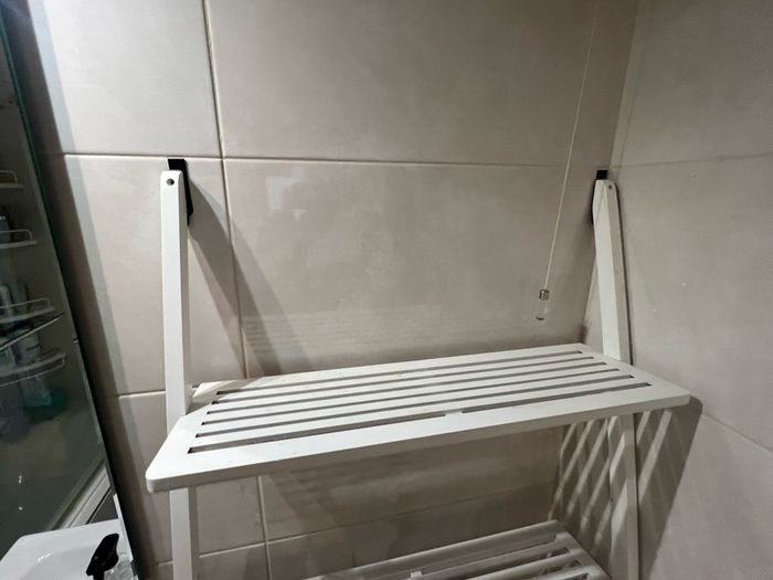 White wooden bathroom storage unit
