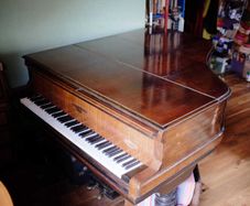 Rogers baby grand piano