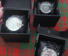 3 x diesel mens watches. Boxes links books.