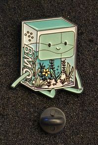 BMO , pin back badge.
