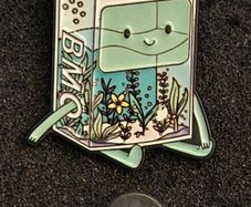 BMO , pin back badge.
