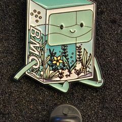 BMO , pin back badge.