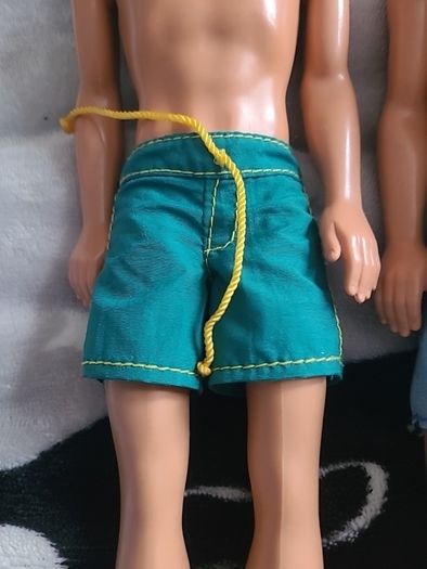 2 ken dolls . 1968 bodies and 1999/1991 heads