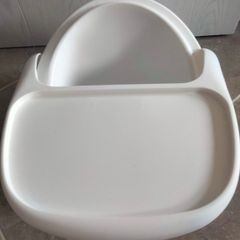 White baby floor seat with tray