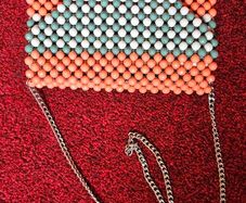 unusual vintage style orange beaded bag