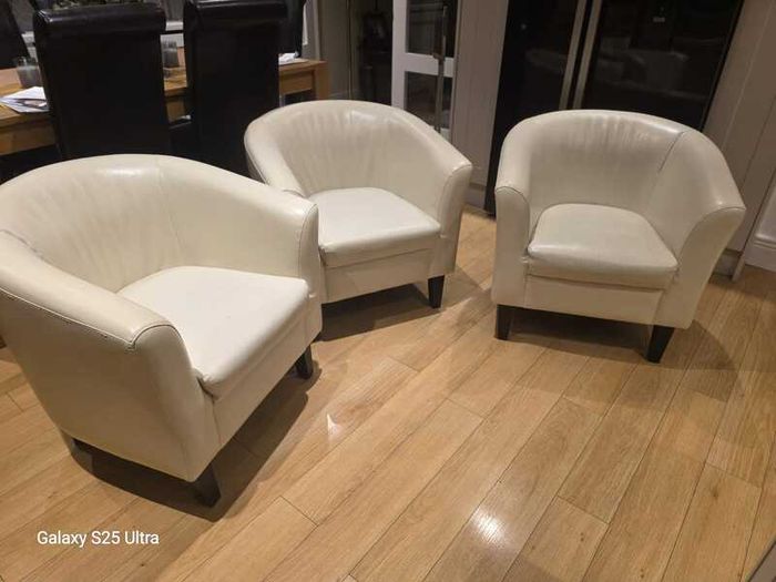 Three stylish leather arm chairs. Two require upholstery