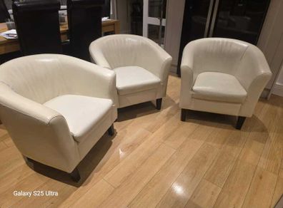 Three stylish leather arm chairs. Two require upholstery