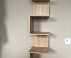 Wall corner hanging shelf