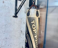 Boxing bag with wall bracket