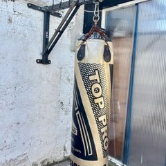 Boxing bag with wall bracket