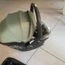 This is an UPPAbaby Mesa i-Size Infant Car Seat in a green-toned fabric. Image 4