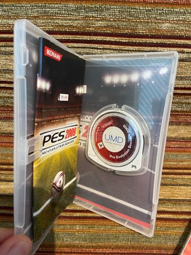 PSP  Console plus 10 games, charger and headphones