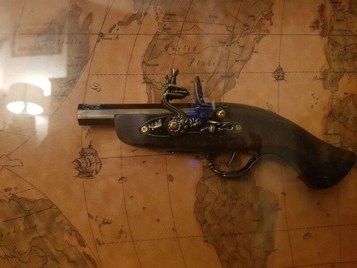 Vintage style wall Decoration with replica pistols