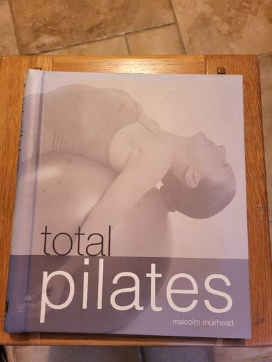 Total Pilates by Malcolm Muirhead.