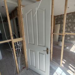 3 white doors
