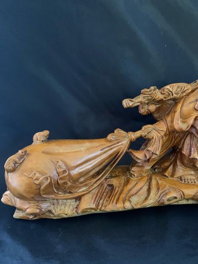 Vintage Maitreya Buddha figure carrying money bag