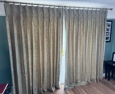Full length curtains with brass poll