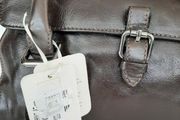 New genuine leather bag tag attached