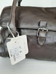 New genuine leather bag tag attached