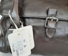 New genuine leather bag tag attached
