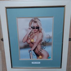 Pamela Anderson Autographed 10x8 Photo Framed with Certificate of Authenticity (COA)