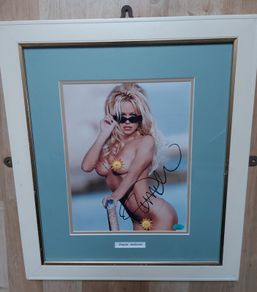 Pamela Anderson Autographed 10x8 Photo Framed with Certificate of Authenticity (COA)