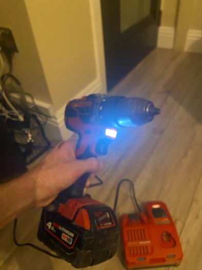 Nearly new Milwaukee M18 red 4.0 new charger pack and box