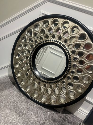 round ornate mirror
