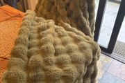 Faux fur green throw with velvet back