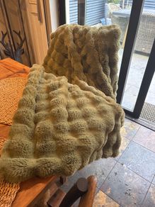 Faux fur green throw with velvet back
