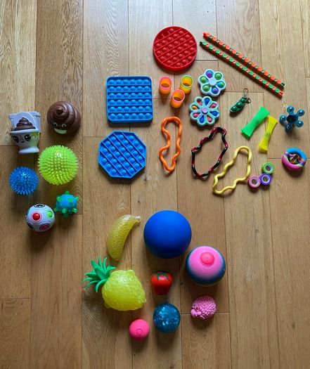 Collection of 35 Pop sockets, squishy, whacky tracks etc