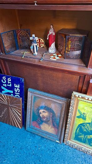 Antique holy statue and pictures