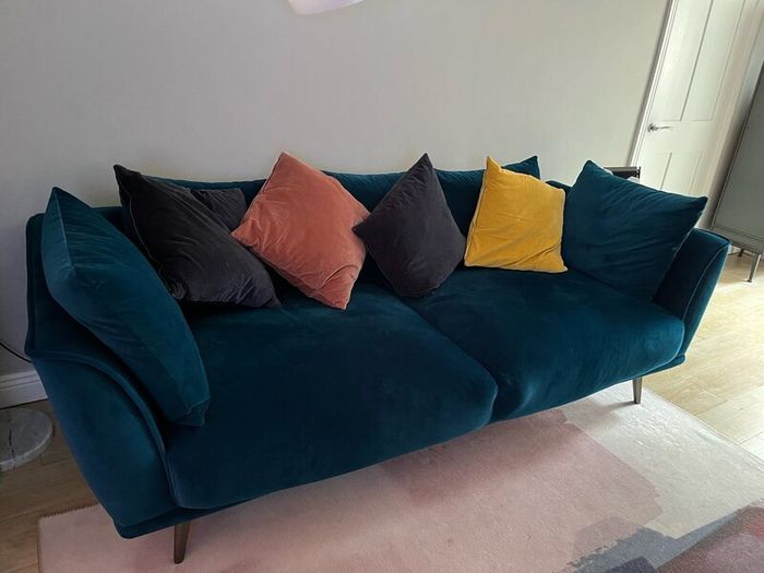 Beautiful teal-coloured sofa