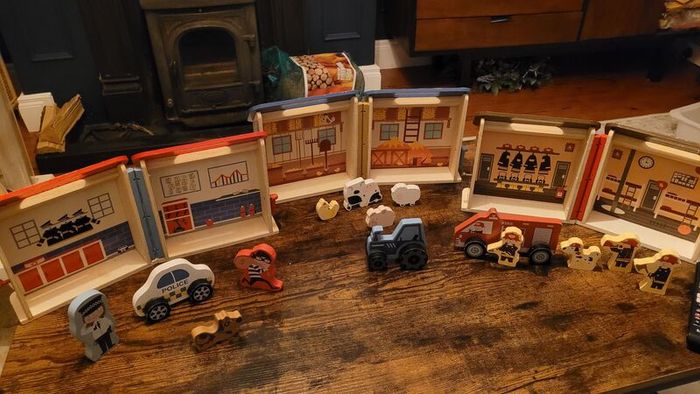 Wooden play toys with figures. Sold as one lot